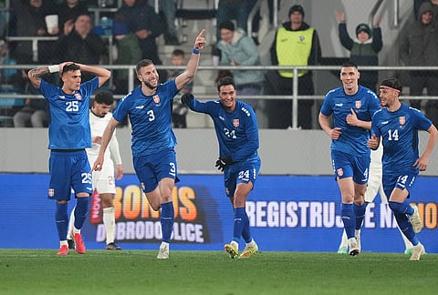 Serbia's Strahinja Pavlovic, second from left, celebrates after scoring his side's first goal during the international friendly soccer match between Serbia and Saudi Arabia in Backa Topola, Serbia.