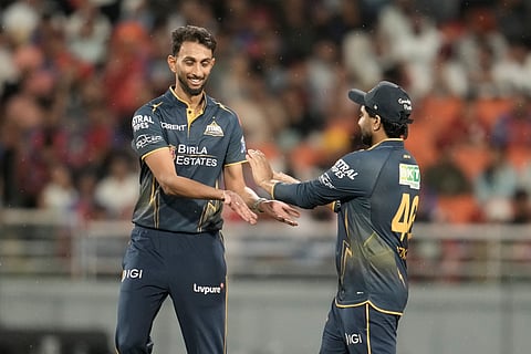 Gujarat Titans' Prasidh Krishna celebrates with teammates the wicket of Punjab Kings' captain Shreyas Iyer during the Indian Premier League cricket match between Gujarat Titans and Punjab Kings in New Chandigarh, India, Tuesday, March 31, 2026