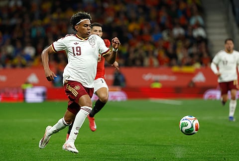 Spain's Lamine Yamal controls the ball during the international friendly soccer match between Spain and Egypt in Barcelona, Spain.