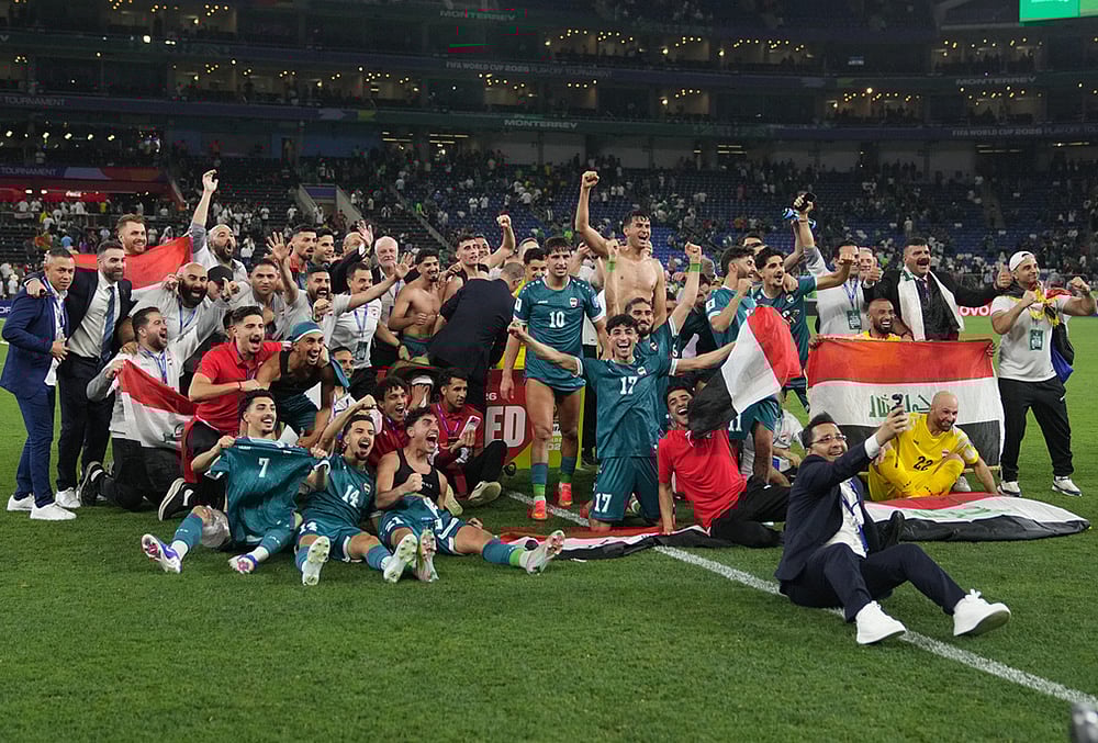 Iraq's players celebrate after the World Cup playoff final soccer match between Iraq and Bolivia in Monterrey, Mexico. - | Photo: AP/Fernando Llano