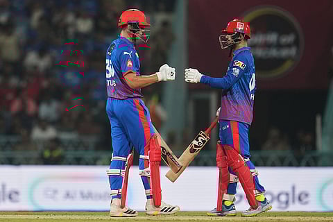 Delhi Capitals' Sameer Rizvi, right, and batting partner Tristan Stubbs encourage each other during the Indian Premier League cricket match between Lucknow Super Giants and Delhi Capitals in Lucknow, India.