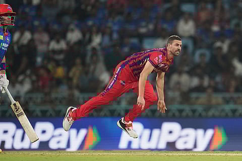 Lucknow Super Giants' Anrich Nortje bowls a delivery during the Indian Premier League cricket match between Lucknow Super Giants and Delhi Capitals in Lucknow, India.