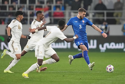Serbia's Strahinja Pavlovic, right, controls the ball during the international friendly soccer match between Serbia and Saudi Arabia in Backa Topola, Serbia.