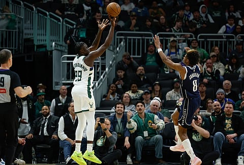 Milwaukee Bucks forward Alex Antetokounmpo (29) shoots against the Dallas Mavericks during the second half of an NBA basketball game in Milwaukee. 