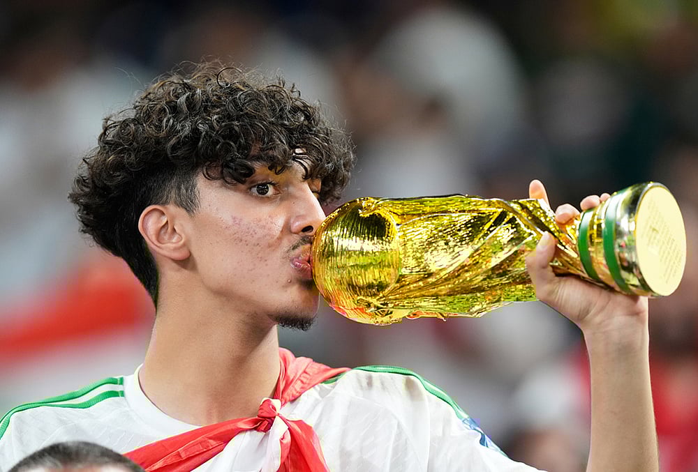 Iraq vs Bolivia World Cup playoff final-replica of the World Cup trophy