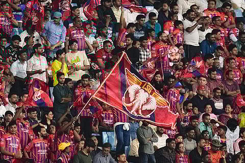 Fans cheer during the Indian Premier League (IPL) 2026 cricket match between Lucknow Super Giants and Delhi Capitals, at Ekana Stadium in Lucknow.