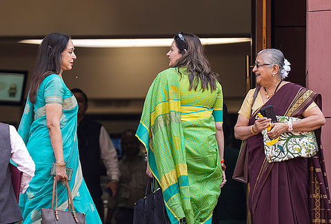 Shiv Sena (UBT) MP Priyanka Chaturvedi, BJP MP Hema Malini, and MP Sudha Murty, during the second part of the Budget session of Parliament, in New Delhi.