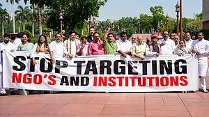 Source: PTI : Opposition MPs Hibi Eden, Prashant Padole, Dean Kuriakose, Supriya Sule, and others, stage a protest during the second part of the Budget session of Parliament, in New Delhi, Wednesday, April 1, 2026.