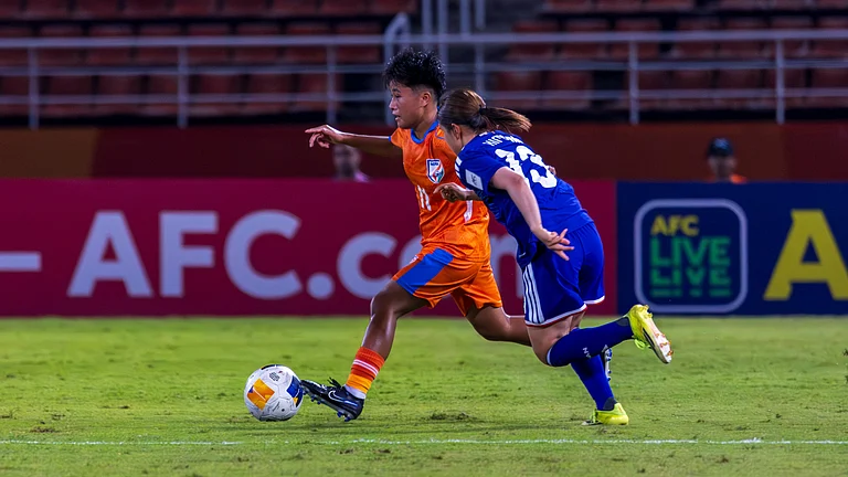 India's Lhingdeikim Kipgen in action against Japan during their AFC Women’s Asian Cup match on April 2, 2026. - | Photo: AIFF