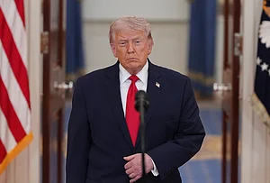 | Photo: AP/Alex Brandon, Pool : US President Donald Trump arrives to speak about the Iran war from the Cross Hall of the White House in Washington.