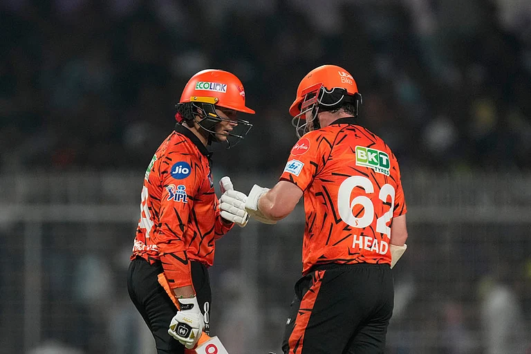 Sunrisers Hyderabad's Travis Head, right, and Sunrisers Hyderabad's Abhishek Sharma celebrate scoring runs during the Indian Premier League cricket match between Kolkata Knight Riders and Sunrisers Hyderabad in Kolkata, India. - | Photo: AP/Bikas Das