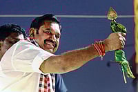 Photo: PTI : Leader of Opposition in the Tamil Nadu Assembly and AIADMK chief Edappadi K Palaniswami during a roadshow ahead of the state Assembly election, in Sivaganga.