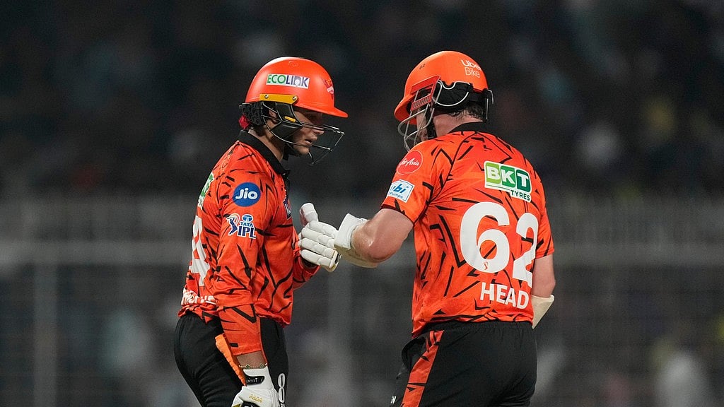 Sunrisers Hyderabad's Travis Head, right, and Sunrisers Hyderabad's Abhishek Sharma celebrate scoring runs during the Indian Premier League cricket match between Kolkata Knight Riders and Sunrisers Hyderabad in Kolkata, India, Thursday, April. 2, 2026. - AP Photo/Bikas Das