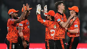 AP : Sunrisers Hyderabad players celebrate the wicket of Kolkata Knight Riders' captain Ajinkya Rahane during their Indian Premier League 2026 match in Kolkata.