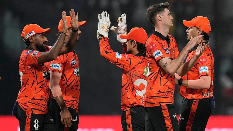 Sunrisers Hyderabad players celebrate the wicket of Kolkata Knight Riders' captain Ajinkya Rahane during their Indian Premier League 2026 match in Kolkata. - AP