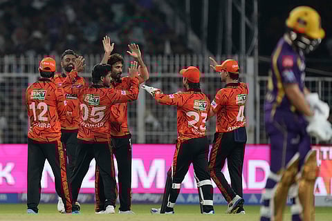 Sunrisers Hyderabad players celebrates the wicket of Kolkata Knight Riders' Anukul Roy, right, during the Indian Premier League cricket match between Kolkata Knight Riders and Sunrisers Hyderabad in Kolkata, India.