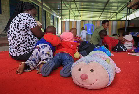 Caregivers interact with children at Greenland Girls School in Kajiado, Kenya.
