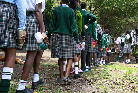 Students queue for breakfast at Greenland Girls School in Kiserian, Kajiado, Kenya.