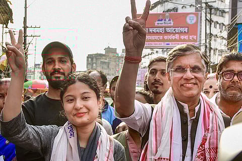 Assam Jatiya Parishad (AJP) candidate from Guwahati Central, Kunki Chowdhury, with Congress leader Pawan Khera during campaigning for the Assam Assembly elections, in Guwahati.