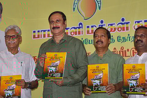 Pattali Makkal Katchi (PMK) President Anbumani Ramadoss releases a party  manifesto ahead of the Tamil Nadu Assembly Election during a press conference, in Chennai.