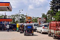 Day In Pics: April 03, 2026 | Photo: PTI : An LPG cylinder carrier truck and other vehicles queue up at a CNG station amid disruptions in supplies due to the ongoing West Asia war, in Chikkamagaluru, Karnataka.