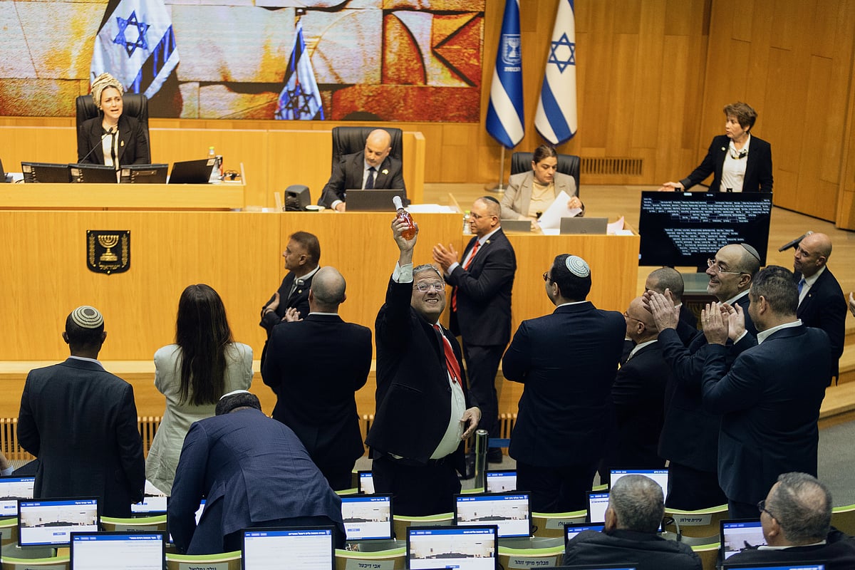 Israel's Minister of National Security, Itamar Ben-Gvir, center, and lawmakers celebrate after Israel's parliament passed a law approving the death penalty for Palestinians convicted of murdering Israelis, at the Knesset in Jerusalem Monday, March 30, 2026. - AP Photo/Itay Cohen