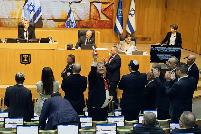 Israel's Minister of National Security, Itamar Ben-Gvir, center, and lawmakers celebrate after Israel's parliament passed a law approving the death penalty for Palestinians convicted of murdering Israelis, at the Knesset in Jerusalem Monday, March 30, 2026. - AP Photo/Itay Cohen