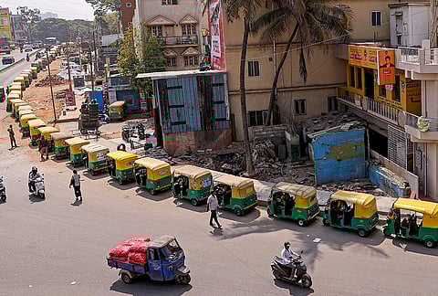 Auto-rickshaws queued up near a fuel station on Kanteerava Studio Main road, in Bengaluru. IndianOil said on Thursday it is currently meeting the fuel requirements of auto rickshaws and LPG-driven cars through its network of 55 Auto LPG Dispensing Stations (ALDS) spread across Karnataka, even as a substantial portion of demand has shifted to public sector outlets due to over 300 privately operated outlets being closed or only partially functional. 