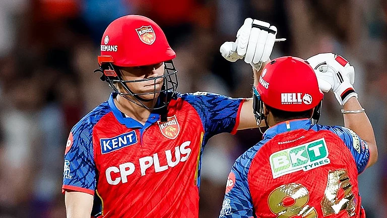 Punjab Kings cricketers in action against Gujarat Titans in IPL 2026 clash at Mullanpur. - PunjabKingsIPL/X