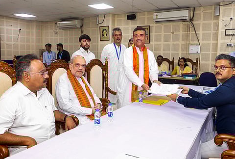 BJP candidate for Bhabanipur and Nandigram Assembly constituencies, Suvendu Adhikari, in the presence of Union Home Minister Amit Shah, files his nomination ahead of the West Bengal Assembly elections,  in Kolkata. 