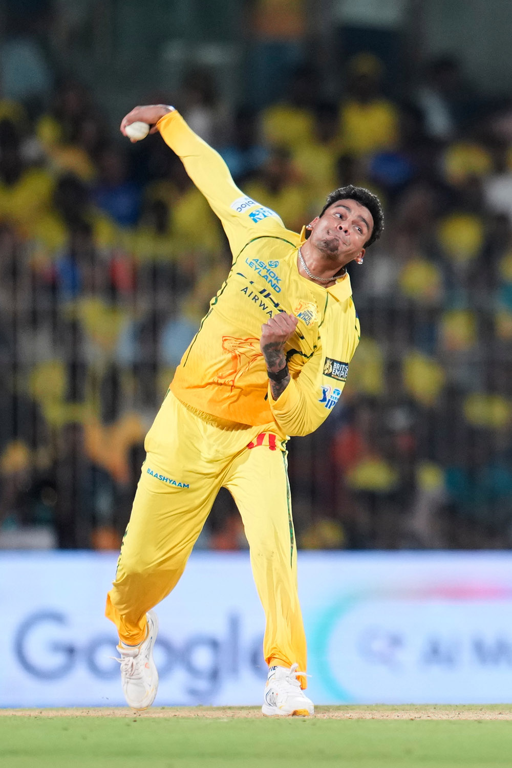 Chennai Super Kings' Rahul Chahar bowls a delivery during the Indian Premier League cricket match between Chennai Super Kings and Punjab Kings in Chennai.
