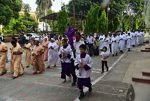 Members of the Christian community during a Good Friday procession, near St Joseph Cathedral Church, in Prayagraj, Uttar Pradesh.