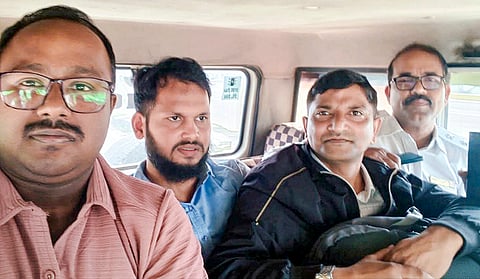 Mofakkerul Islam, second right, alleged mastermind of the Kaliachak incident, was nabbed before boarding a flight to flee, according to the officials, near Bagdogra Airport, Siliguri.