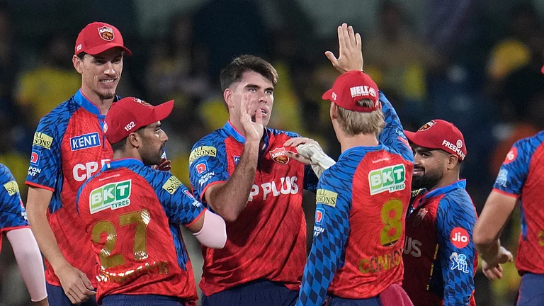 Punjab Kings' Xavier Bartlett, center, celebrates the wicket of Chennai Super Kings' wicketkeeper Sanju Samson with teammates during the Indian Premier League cricket match between Chennai Super Kings and Punjab Kings in Chennai, India, Friday, April 3, 2026. - AP Photo