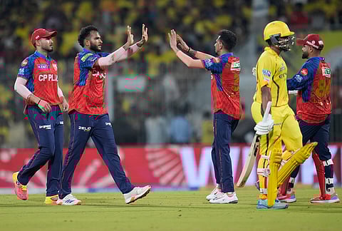 Punjab Kings' Vijaykumar Vyshak, second left, celebrates the wicket of Chennai Super Kings' Ayush Mhatre, second right, with teammates during the Indian Premier League cricket match between Chennai Super Kings and Punjab Kings in Chennai.