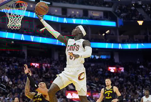 Cleveland Cavaliers guard Dennis Schroder shoots against the Golden State Warriors during the second half of an NBA basketball game in San Francisco.