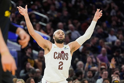 Cleveland Cavaliers guard Max Strus (2) reacts after scoring against the Golden State Warriors during the second half of an NBA basketball game in San Francisco.