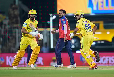 Punjab Kings' Vijaykumar Vyshak, center looks as Chennai Super Kings' Ayush Mhatre and captain Ruturaj Gaikwad run between the wickets to score during the Indian Premier League cricket match between Chennai Super Kings and Punjab Kings in Chennai.