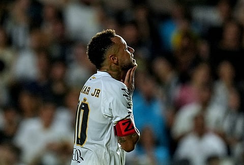 Santos' Neymar reacts during a Brazilian soccer league match against Remo in Santos, Brazil.