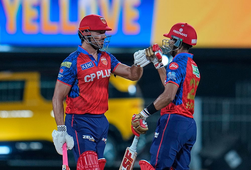 Punjab Kings' Marcus Stoinis with batting partner Shashank Singh celebrate after wining against Chennai Super Kings' during the Indian Premier League cricket in Chennai. - | Photo: AP/Aijaz Rahi