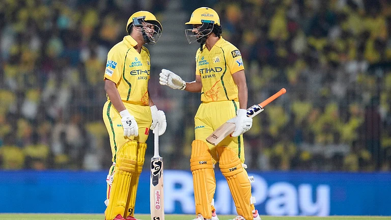 Chennai Super Kings' captain Ruturaj Gaikwad talks to batting partner Ayush Mhatre during the Indian Premier League cricket match between Chennai Super Kings and Punjab Kings in Chennai, India, Friday, April 3, 2026. - AP Photo
