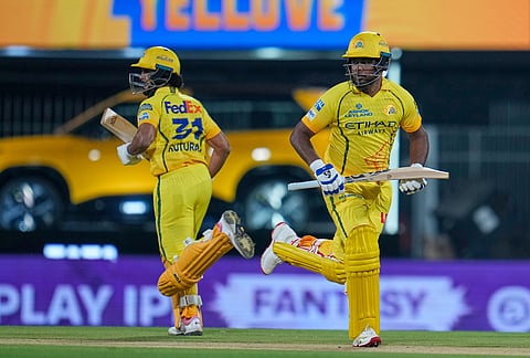 Chennai Super Kings' wicketkeeper Sanju Samson with captain Ruturaj Gaikwad run between the wickets to score during the Indian Premier League cricket match between Chennai Super Kings and Punjab Kings in Chennai.