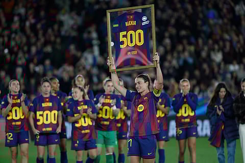 Barcelona's Alexia Putellas celebrates her 500th match with Barcelona at the end of a Champions League quarterfinal soccer match between Barcelona and Real Madrid, in Barcelona, Spain.
