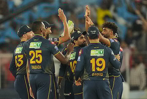 Gujarat Titans players celebrates the wicket of Rajasthan Royals' Donovan Ferreira during the Indian Premier League cricket match between Gujarat Titans and Rajasthan Royals in Ahmedabad.
