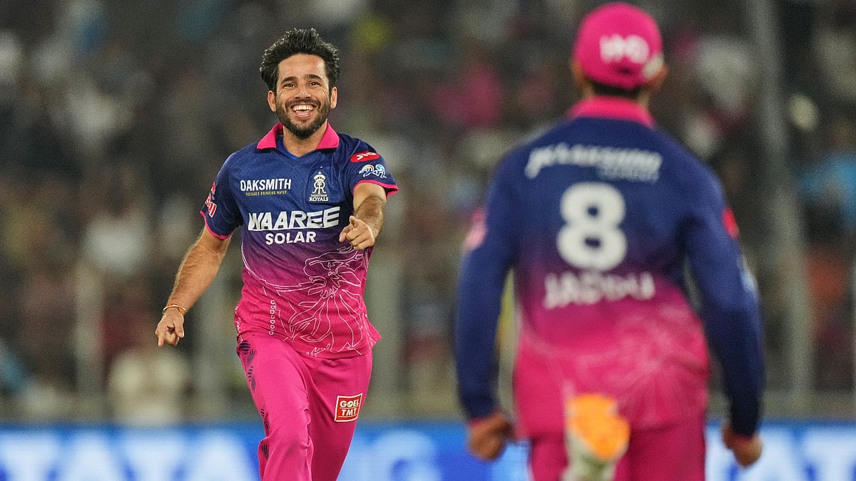 Ravi Bishnoi celebrates his wicket with Ravindra Jadeja during Gujarat Titans vs Rajasthan Royals IPL 2026 match.  - null