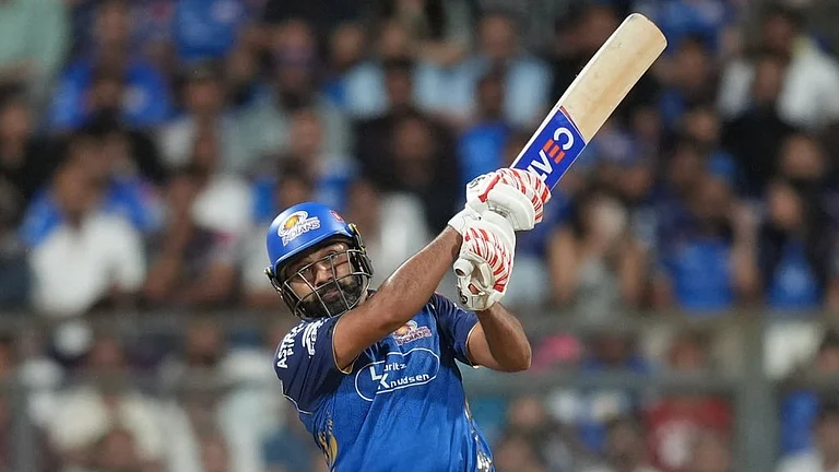 Mumbai Indians' Rohit Sharma plays a shot during the Indian Premier League cricket match between Mumbai Indians and Kolkata Knight Riders in Mumbai, India, Sunday, March 29, 2026. - AP Photo/Rafiq Maqbool