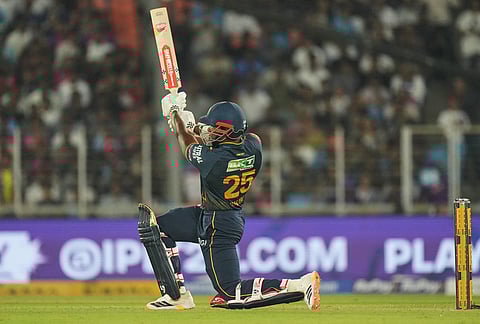 Gujarat Titans' Kagiso Rabada plays a shot during the Indian Premier League cricket match between Gujarat Titans and Rajasthan Royals in Ahmedabad.
