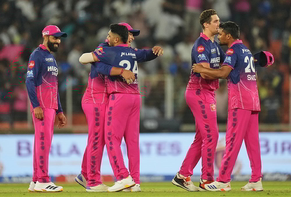 Rajasthan Royals players celebrate after winning the Indian Premier League cricket match against Gujarat Titans in Ahmedabad. - | Photo: AP/Ajit Solanki