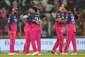 | Photo: AP/Ajit Solanki : Rajasthan Royals players celebrate after winning the Indian Premier League cricket match against Gujarat Titans in Ahmedabad.