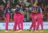| Photo: AP/Ajit Solanki : Rajasthan Royals players celebrate after winning the Indian Premier League cricket match against Gujarat Titans in Ahmedabad.